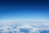 Blue sky over clouds at high altitude