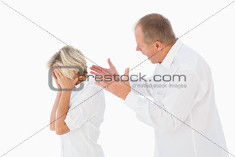 Angry man shouting at his partner
