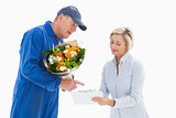 Happy flower delivery man with customer