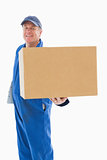 Happy delivery man showing cardboard box