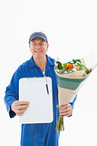 Happy flower delivery man showing clipboard