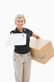 Happy delivery woman looking for signature