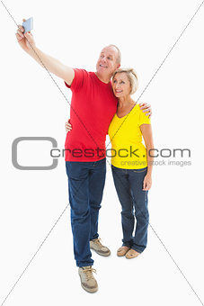 Happy mature couple taking a selfie together