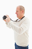 Happy mature man taking a picture