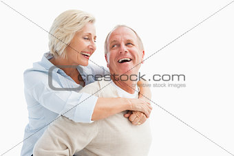 Happy mature couple smiling at each other