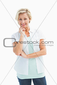 Happy mature woman smiling at camera