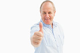 Happy mature man showing thumbs up to camera