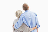 Mature couple hugging and looking