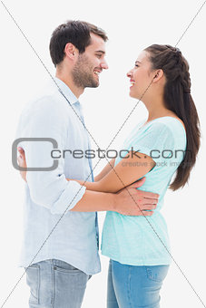 Attractive young couple hugging each other