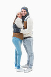 Attractive young couple in warm clothes hugging