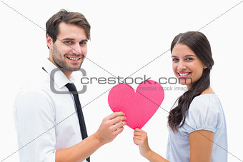 Pretty brunette giving boyfriend her heart