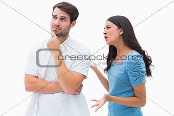 Angry brunette shouting at boyfriend