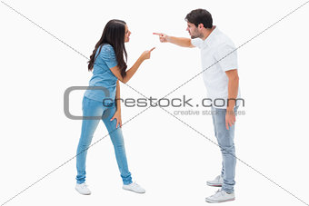 Angry couple shouting at each other