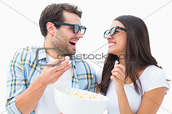 Attractive young couple watching a 3d movie