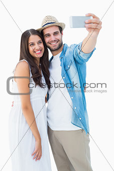 Happy hipster couple taking a selfie