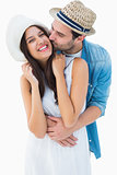 Happy hipster couple hugging and smiling