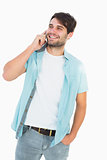 Happy casual man talking on phone