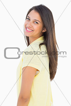 Happy casual woman smiling at camera