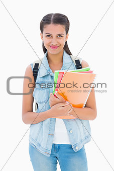 Pretty student smiling at camera