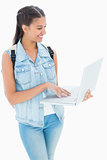 Pretty student using her laptop