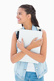 Pretty student holding her laptop