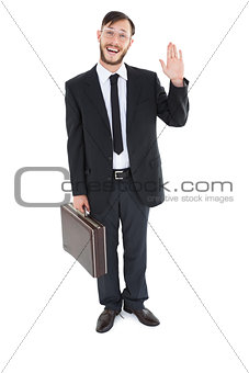 Geeky businessman waving at camera