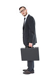 Geeky businessman holding his briefcase