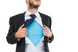 Geeky hipster opening shirt superhero style