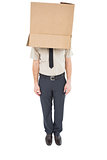 Businessman standing with box on head