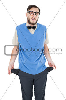 Geeky hipster showing empty pockets