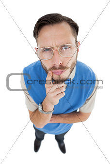 Geeky hipster looking at camera
