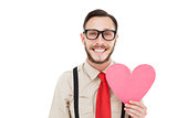 Geeky hipster smiling and holding heart card