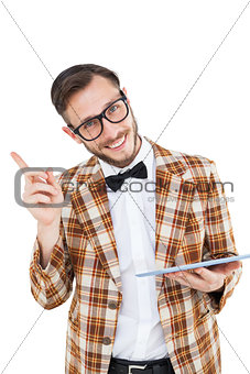 Geeky hipster holding a tablet pc