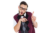 Geeky hipster in sweater vest pointing