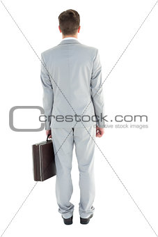Businessman holding his briefcase