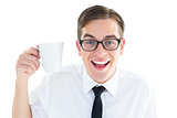 Geeky businessman holding a mug