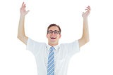 Geeky happy businessman with arms up