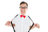 Geeky hipster pulling his suspenders