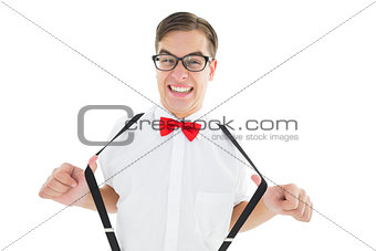 Geeky hipster pulling his suspenders