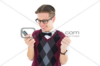Excited geeky hipster texting on the phone