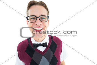 Smiling geeky hipster looking at camera