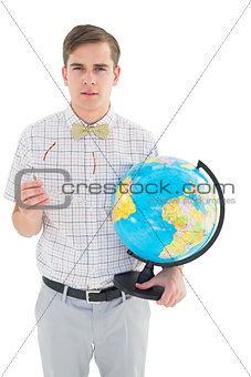 Geeky hipster holding a globe