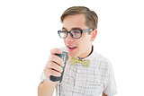 Geeky hipster speaking into dictaphone