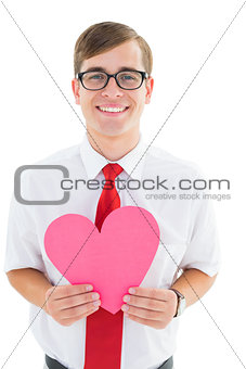 Geeky hipster holding heart card