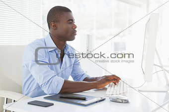 Focused businessman working at his desk