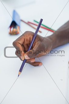 Man drawing with colour pencils
