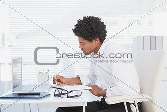 Focused businessman working at his desk