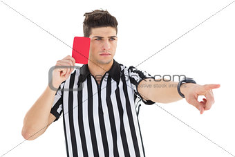 Stern referee showing red card