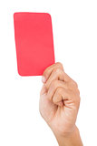 Hand holding up red card