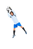 Goalkeeper in blue saving ball